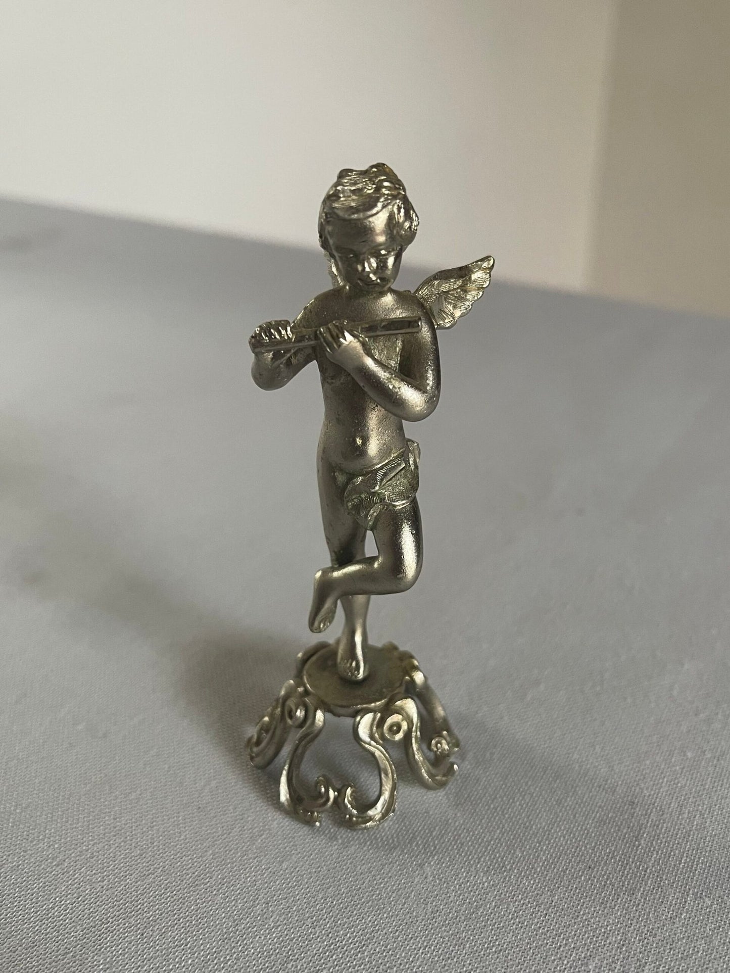 Statuetta di Cupido/Angelo in Metallo Argentato con Flauto