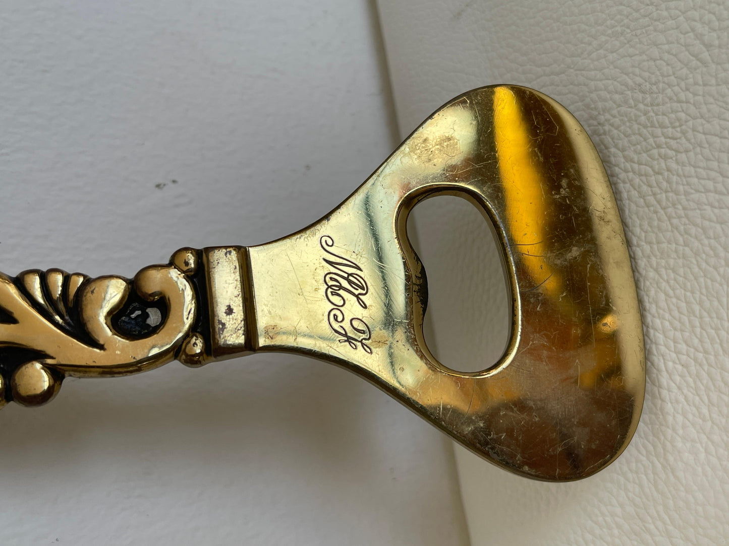 Antico cavatappi italiano in bronzo dorato 1930