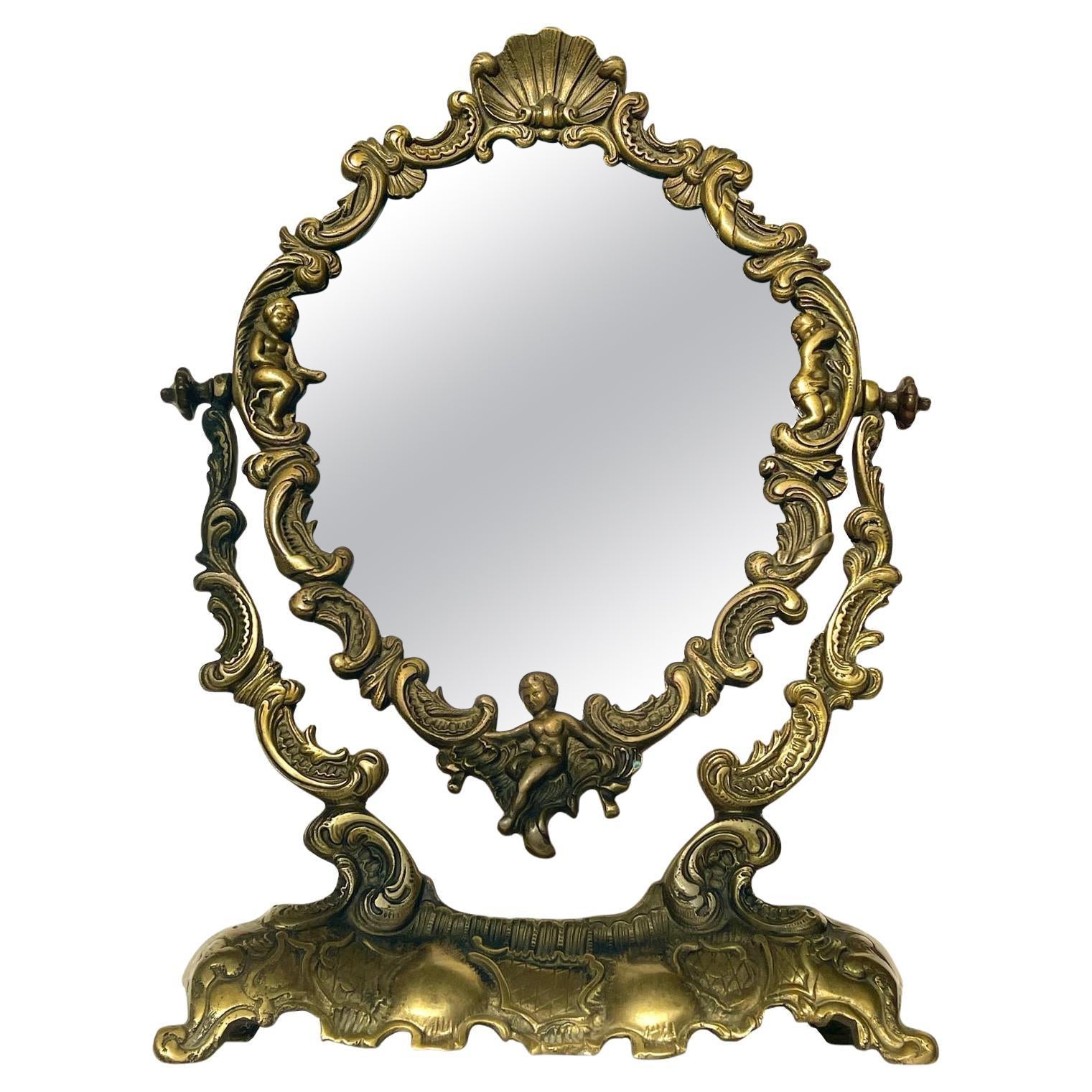 Antico specchio francese in bronzo con angelo anni '30