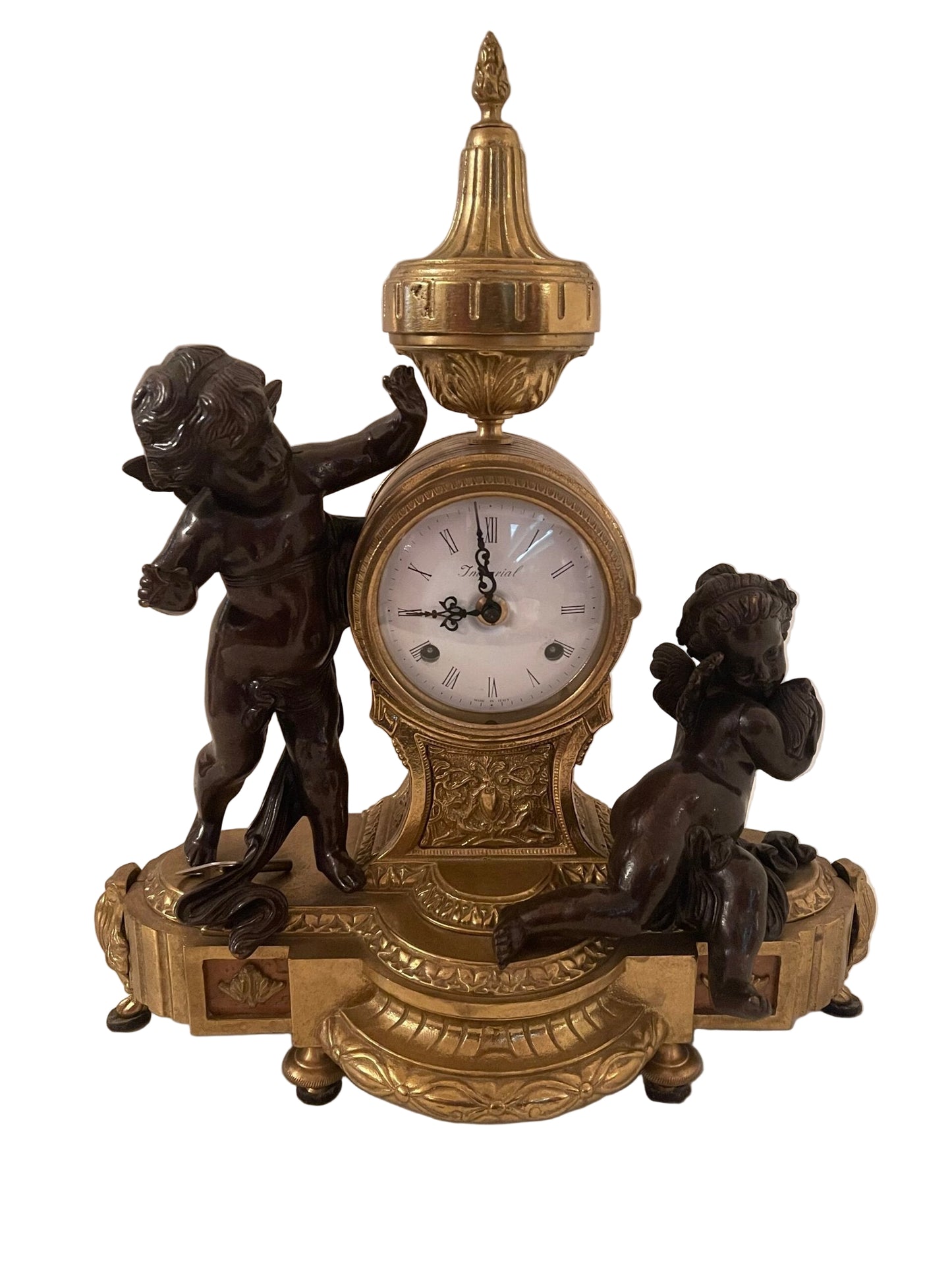 Orologio da caminetto con putti in stile Impero