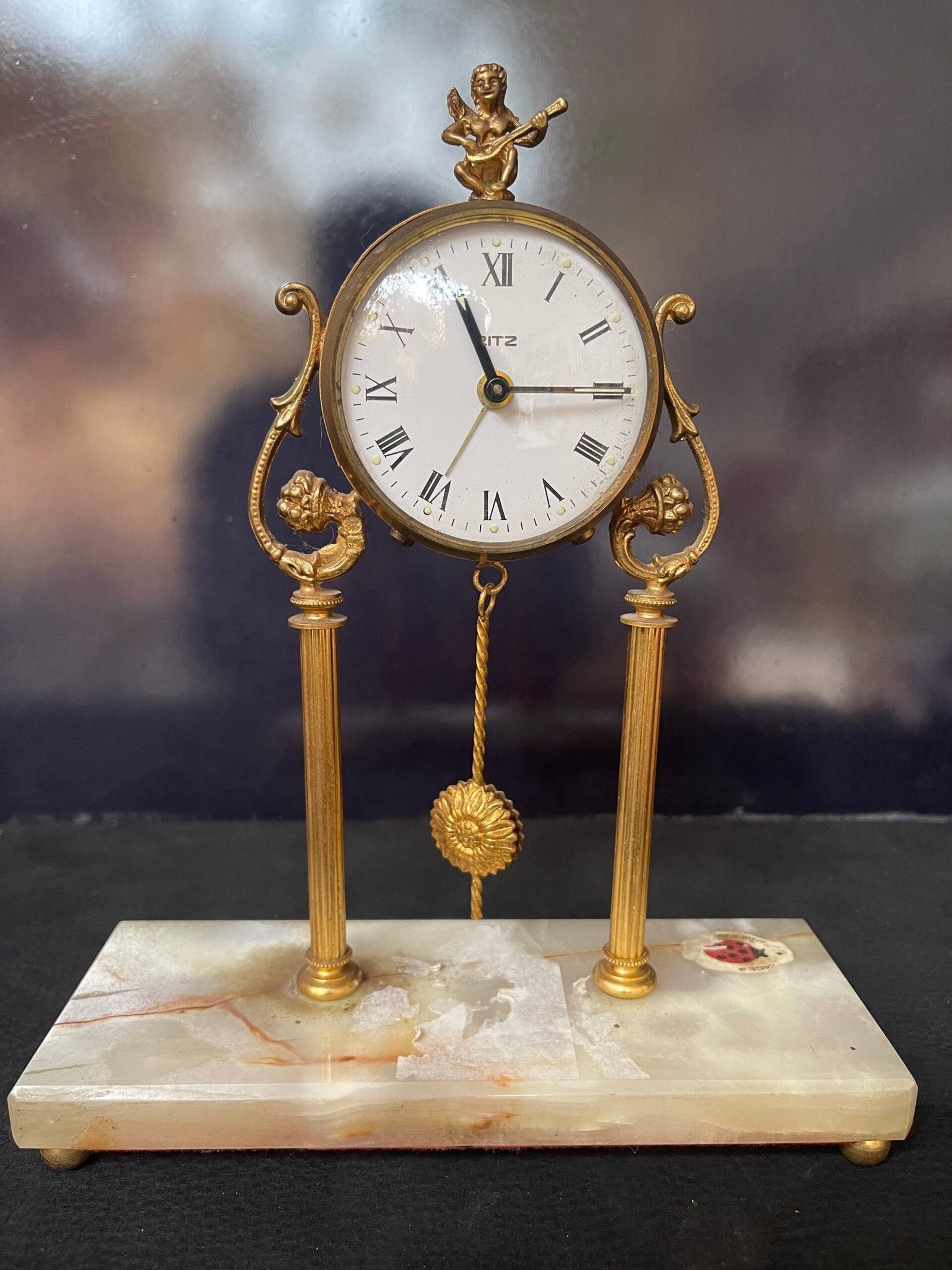 Orologio da tavolo “Ritz” con base in onice