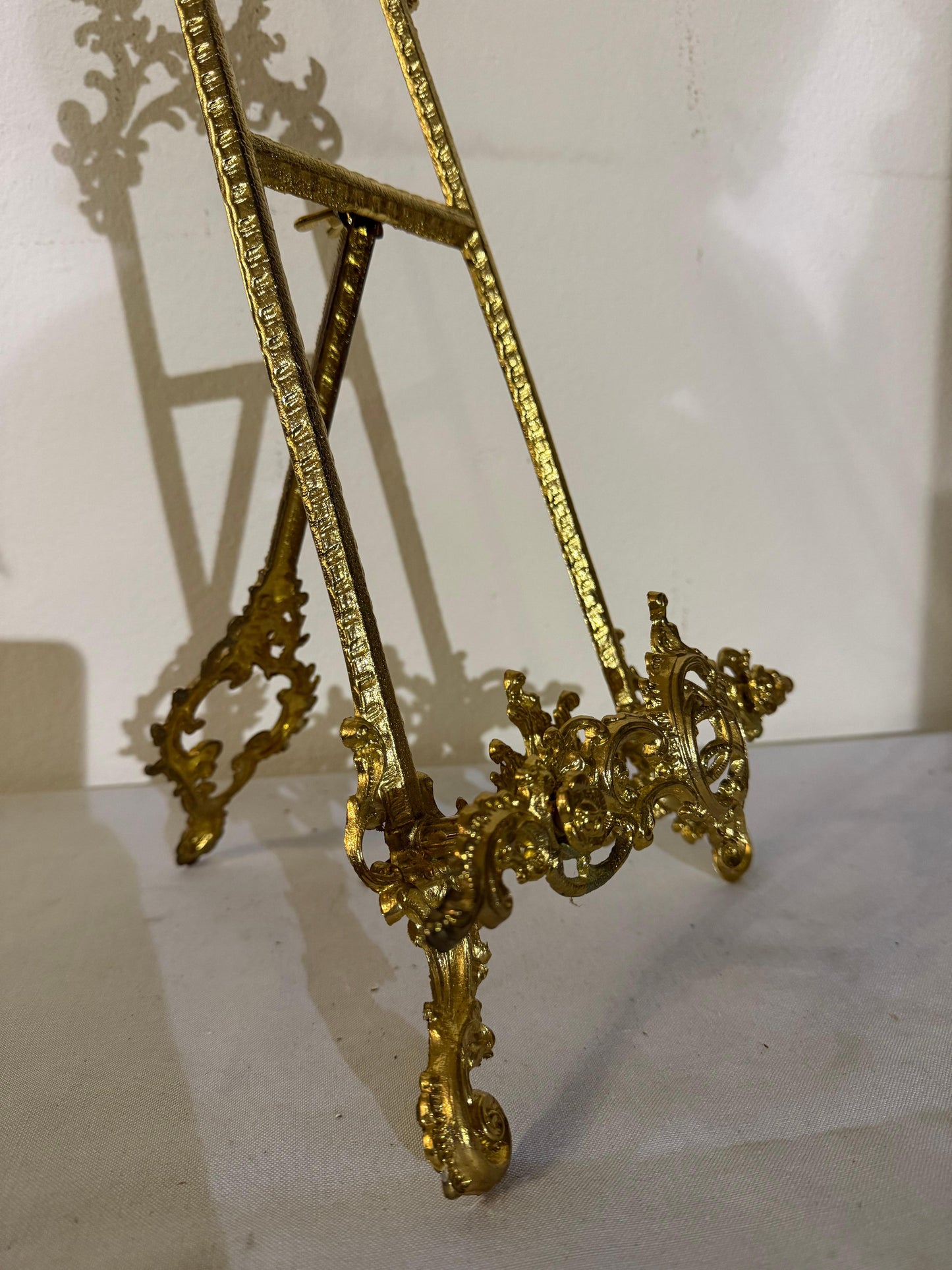 Cavalletto in bronzo lucido portafoto stile francese secolo XX