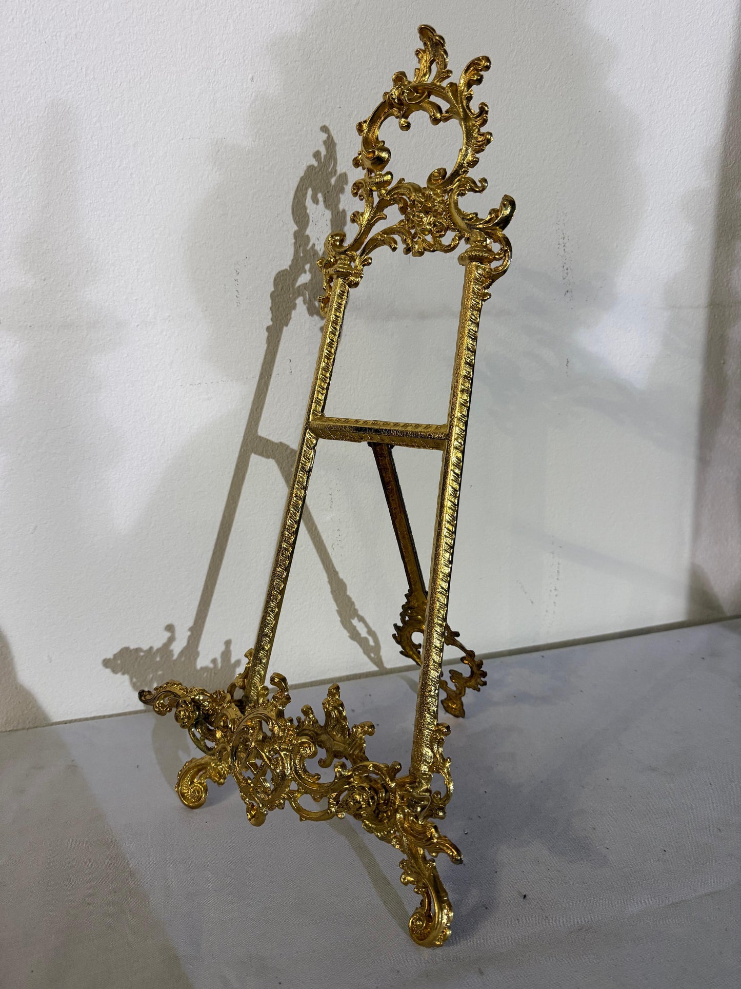 Cavalletto in bronzo lucido portafoto stile francese secolo XX