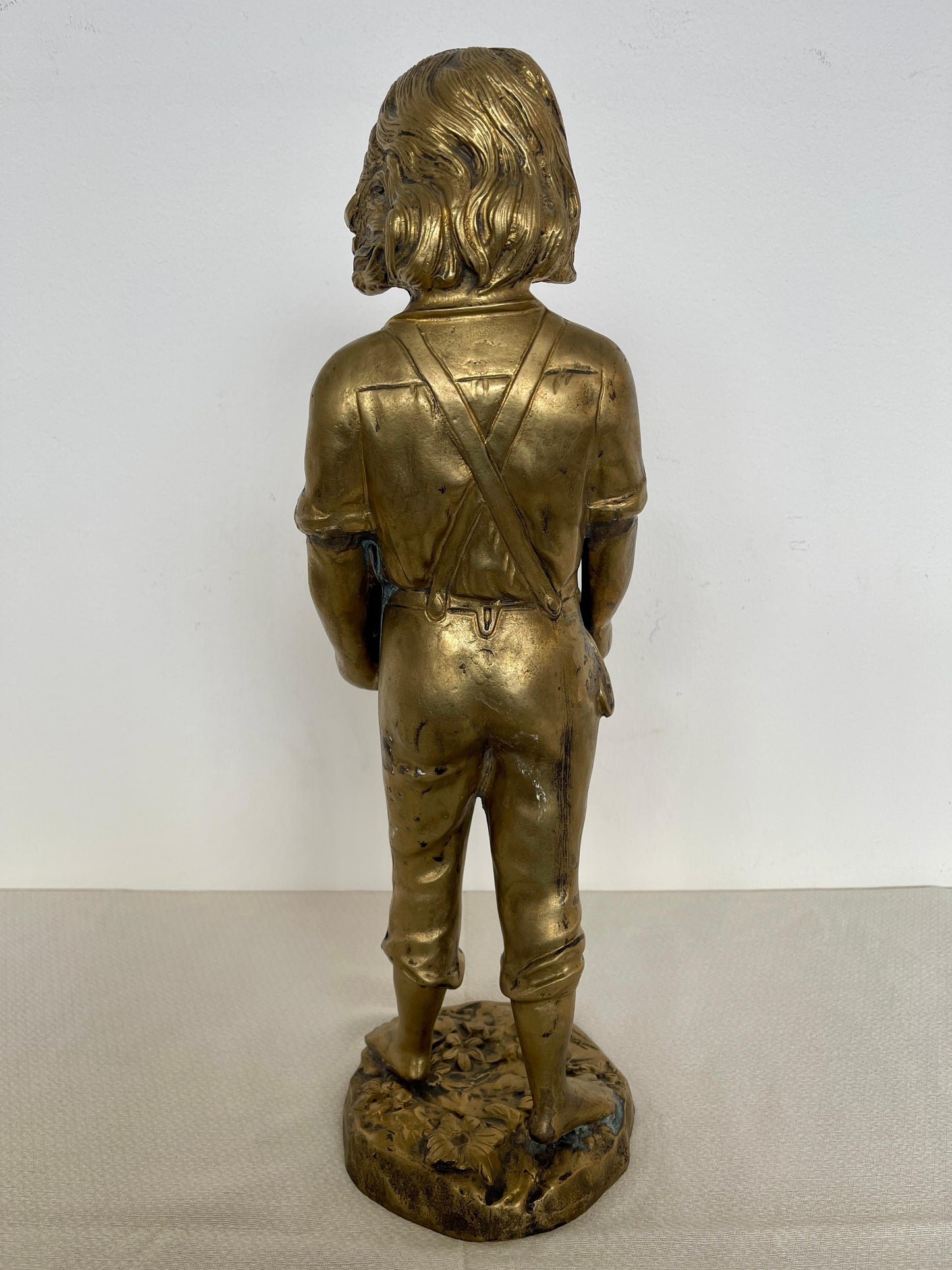 Statuetta in bronzo raffigurante bambino con cuccioli secolo XIX SECOLO