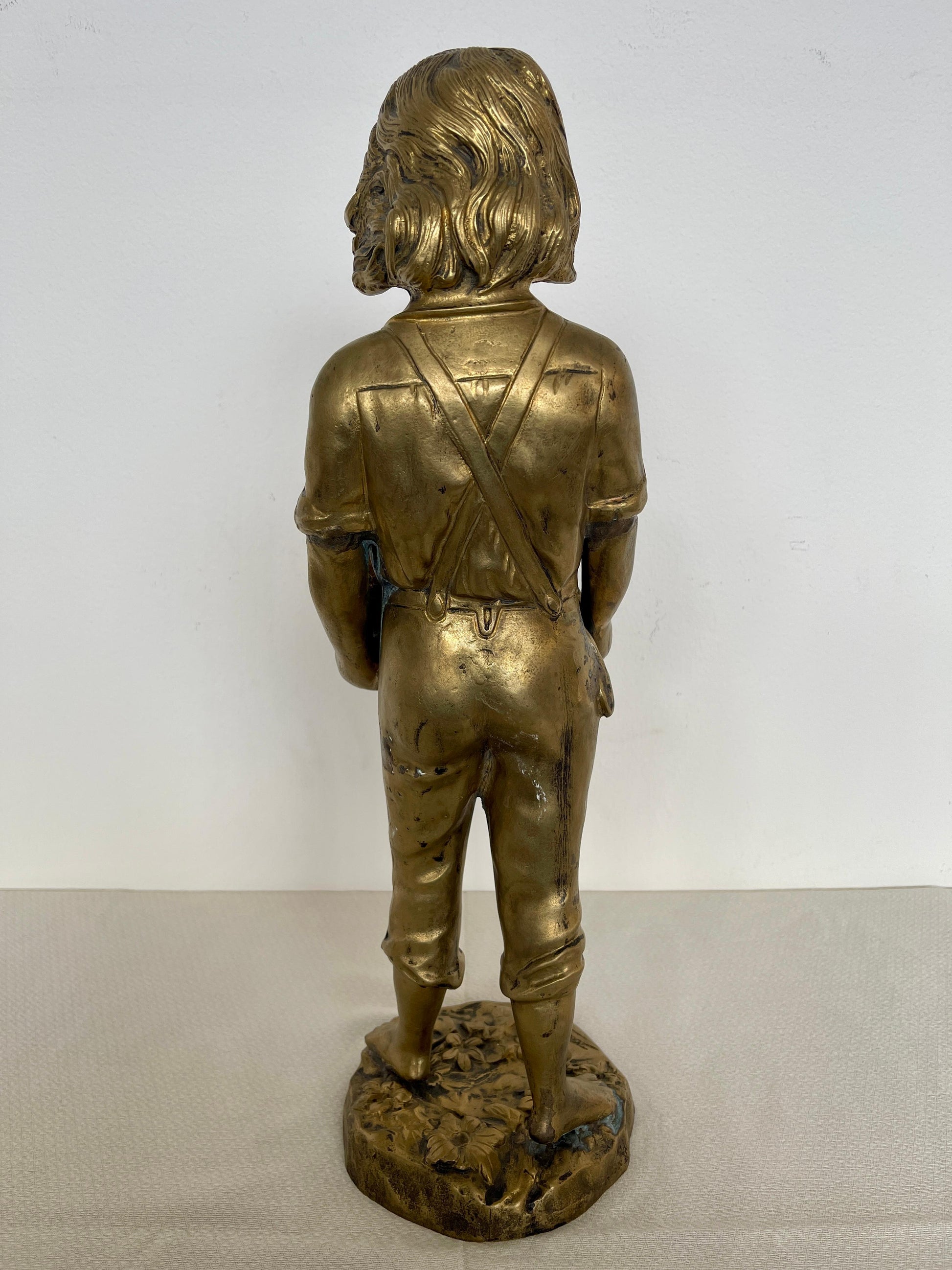 Statuetta in bronzo raffigurante bambino con cuccioli secolo XIX SECOLO