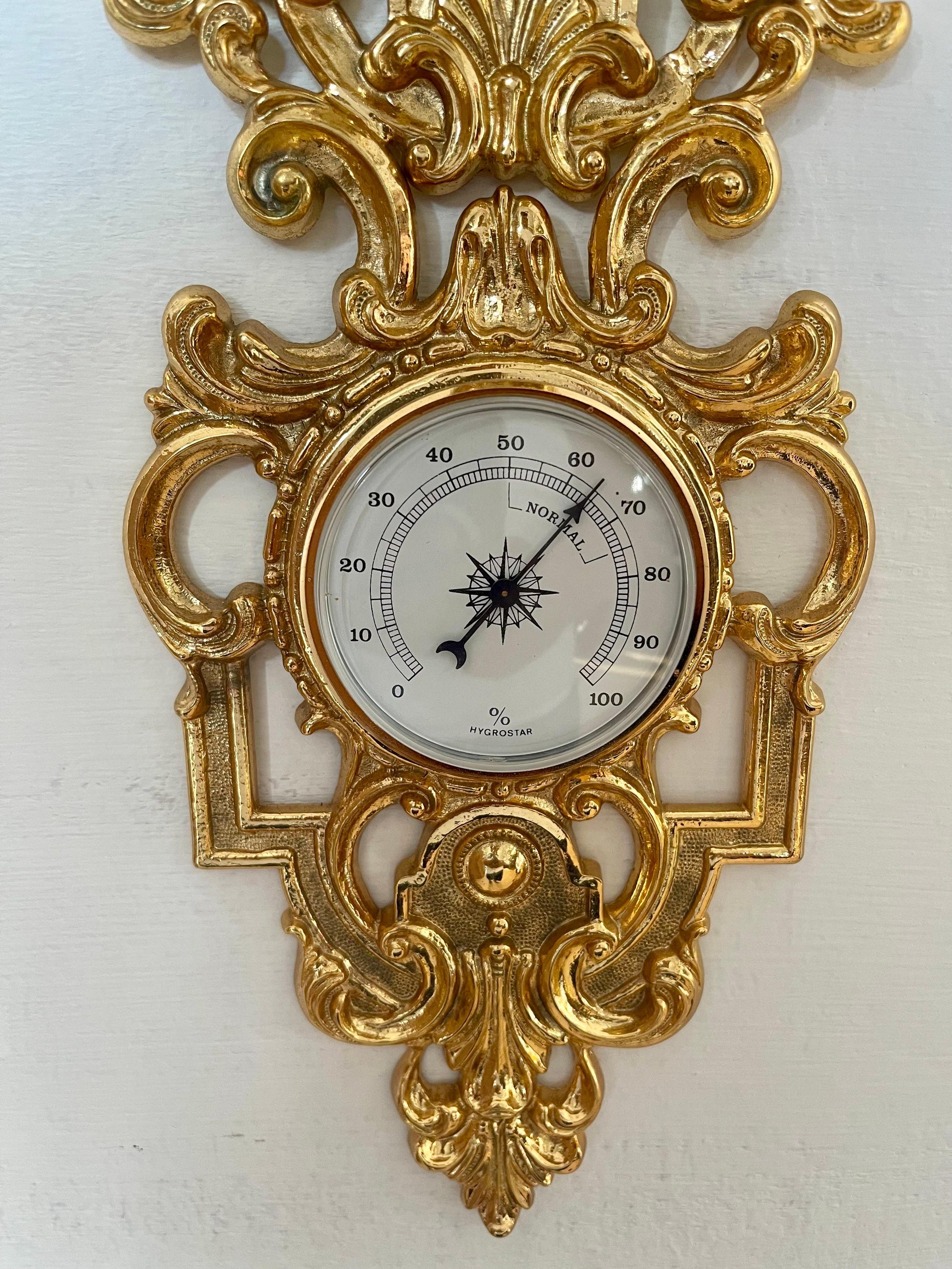 Bellisima Orologio con barometro in ottone dorato XX