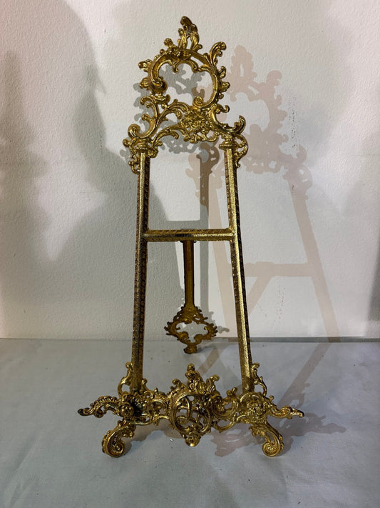 Cornice in bronzo dorato