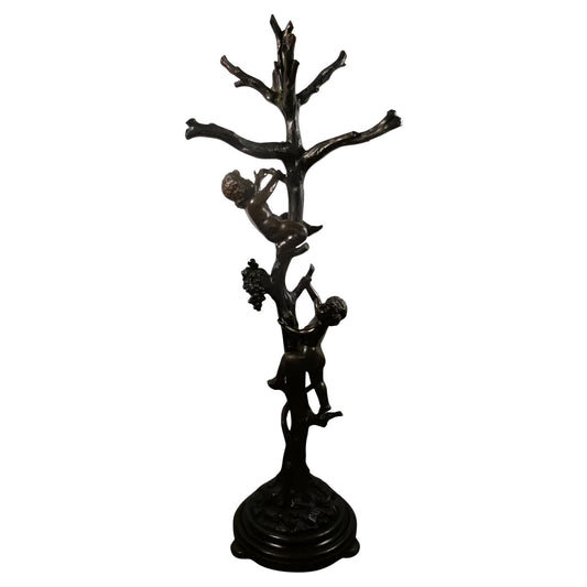 Scultura appendiabiti in legno intagliato con statua albero e due putti 1900