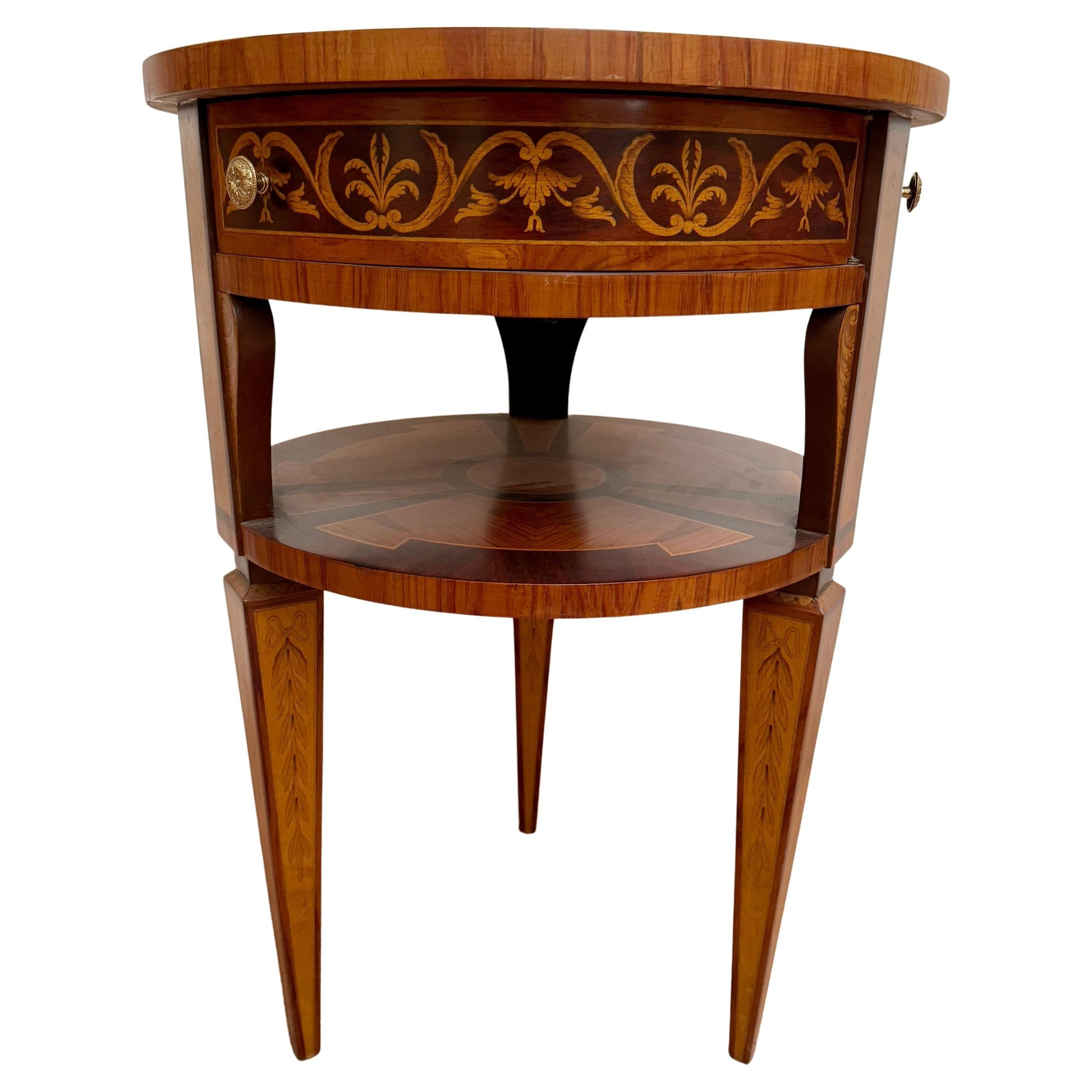 Tavolino antico da centrostanza in legno policromi appartenente con 3 cassetti