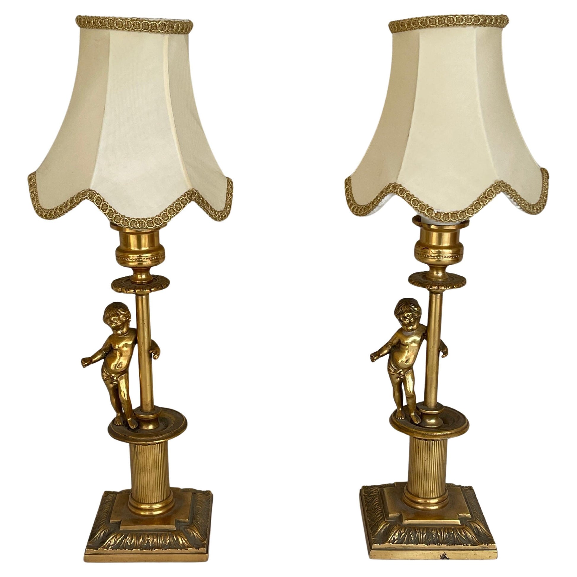 Coppia di lampade da tavolo francesi a forma di putti degli anni '50